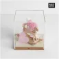 Preview: Mini-Schaukelpferd mit rosa Miniatur-Strickmütze als Dekoration für ein Geschenk zur Geburt eines Mädchens