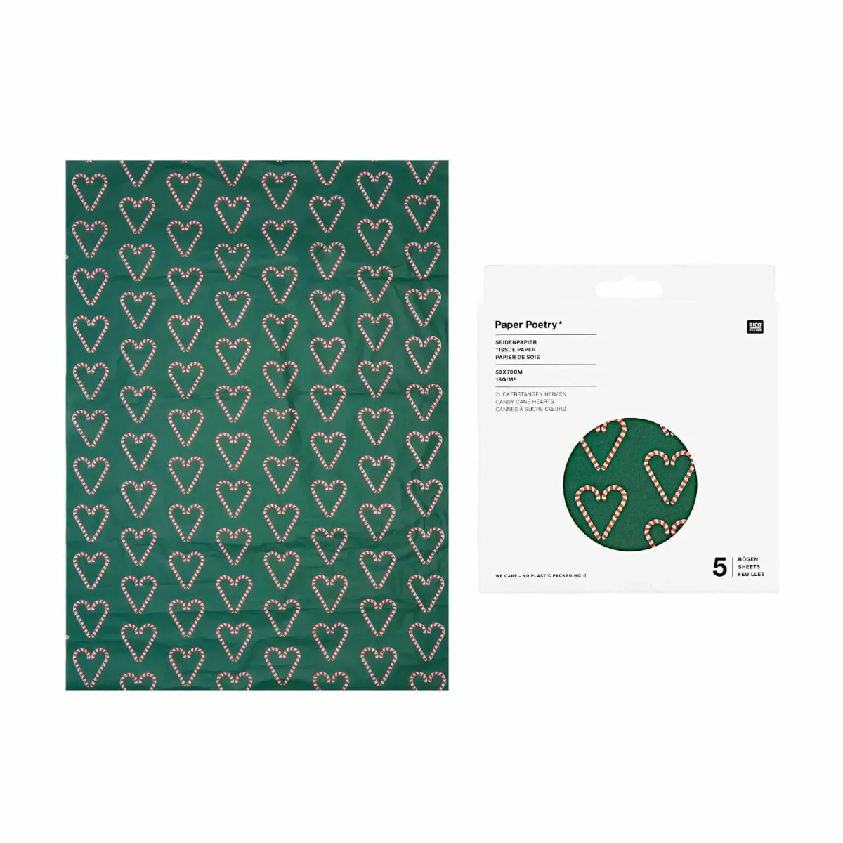 Seidenpapier mit Zuckerstangen-Herzen und in der Verpackung